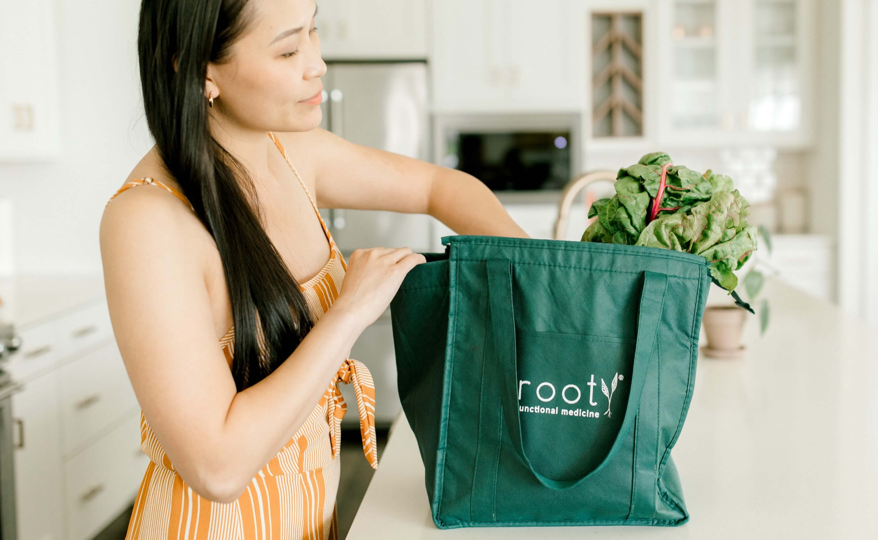 woman reaching into bag